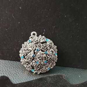 Elegant Silver and Blue Floral Pendant